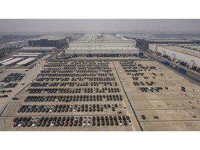 Vehicles in a lot at the Tesla Inc. Gigafactory in Shanghai, China, on Wednesday, June 15, 2022. Tesla has staged a remarkable comeback in terms of its production in China, with May output more than tripling despite the electric carmaker only recently getting its Shanghai factory back up to speed after the city's punishing lockdowns.