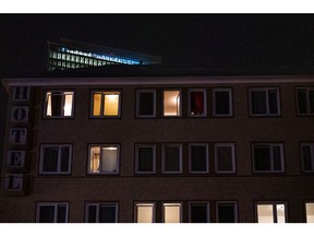 A partially lit hotel at night in Frankfurt, Germany, on Wednesday, July 27, 2022. Germany is set to bring some coal plants back online to keep the lights on this winter while higher power prices are contributing to record inflation and squeezing consumers as they struggle with higher bills.
