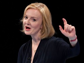 Liz Truss, UK foreign secretary, answers questions from party members in the audience during the first Conservative Party leadership hustings in Leeds, UK, on Thursday, July 28, 2022. The UK appears set to privatize Channel Four Television Corp. after both Conservative Party candidates vying to be prime minister indicated support for the plan.