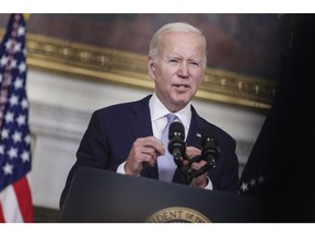 US President Joe Biden speaks on the Inflation Reduction Act Of 2022 in the State Dining Room of the White House in Washington, D.C., US, on Thursday, July 28, 2022. The plan, announced by the two Democrats on Wednesday evening, would generate an estimated $739 billion in revenue, spend $433 billion and reduce deficits by $300 billion over a decade.