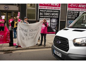 Striking BT Group workers protest the cost of living on a picket line in London, on Aug. 1.