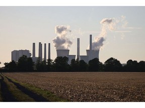 BERGHEIM, GERMANY - AUGUST 02: Steam rises from cooling towers of the Neurath coal-fired power plants on August 02, 2022 near Neurath, Germany. The German government, in a bid to raise its reserves of natural gas ahead of the coming winter, is turning to coal among alternatives for electricity production. Germany produces approximately 15% of its electricity with natural gas and is seeking to reduce its consumption due to ongoing tensions with Russia, from which it still imports large quantities of gas. Russia has reduced gas flows to Germany as a consequence of Germany's support for Ukraine against Russia's ongoing military invasion.