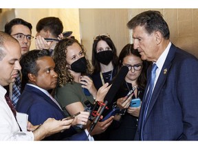 Senator Joe Manchin, a Democrat from West Virginia, speaks to members of the media on Capitol Hill in Washington, D.C., US, on Sunday, Aug. 7, 2022. The Senate is voting on a lengthy series of amendments to the Democrats' $437 billion climate, health and tax package leading up to expected passage of the legislation as soon as this afternoon.