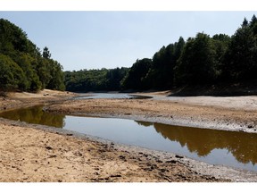 Dried mud on the exposed bed of the Ardingly Reservoir, operated by South East Water Ltd., near Haywards Heath, UK, on Friday, Aug. 12, 2022. Extreme heat and dry weather are putting intense pressure on England's water supply.