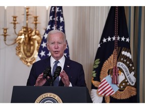 US President Joe Biden speaks before signing H.R. 5376, the Inflation Reduction Act of 2022, in the State Dining Room of the White House in Washington, D.C., US, on Tuesday, Aug. 16, 2022. House Democrats last week delivered the final votes needed to send Biden a slimmed-down version of his tax, climate and drug price agenda, overcoming a year of infighting.