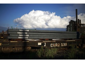 A fright train carries steel at the Cleveland-Cliffs Inc. Cleveland Works steel mill in Cleveland, Ohio, US, on Wednesday, Aug. 17, 2022. US steel may be showing the first inkling of a slowdown in demand as construction-sector demand softens, according to Cleveland Cliffs Inc., the nation's second-largest steelmaker.