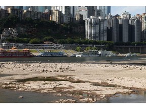 The Jialing River bed is exposed due to drought on August 23, 2022 in Chongqing, China. Photographer: Zhou Yi/China News Service/Getty Images