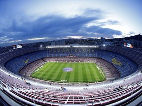 FILE - A general view of the Camp Nou stadium prior of a Spanish Copa del Rey soccer match between Barcelona and Leganes, in Barcelona, Spain, Thursday, Jan. 30, 2020. Barcelona has auctioned off a digital art piece depicting an iconic goal by Johan Cruyff for $693,000 as it seeks new revenues to battle its way out of massive debt. Barcelona says that the auction run by Sotheby's in New York for the club's first NFT, or non-fungible token, closed at $550,000. The auctioneer's fees increased the final sale price to $693,000.
