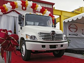 FILE - The first Hino truck assembled in North America is unveiled Tuesday, Oct. 19, 2004, at the Toyota's longest operating U.S. manufacturing facility, TABC, Inc. in Long Beach, Calif. Hino Motors, a truck maker that's part of the Toyota group, systematically falsified emissions data, dating back as far back as 2003, according to a special investigation disclosed Tuesday, Aug. 2, 2022.