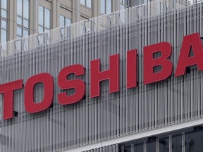 FILE - The logo of Toshiba Corp. is seen at a company's building in Kawasaki near Tokyo, on Feb. 19, 2022. Toshiba reported Wednesday, Aug. 8, 2022, a 44% improvement in profit for the first fiscal quarter as the Japanese technology giant sought to revamp its brand image and reassure investors about its management.