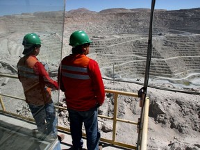 Workers at the world's biggest copper mine in Chile, in 2008.