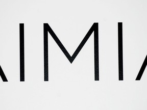 Aimia Inc. reported a net loss of $35.2 million in its latest quarter, compared with a profit of $3.1 million in the same quarter last year. An AIMIA logo is shown at the company's annual general meeting in Montreal on May 4, 2012.