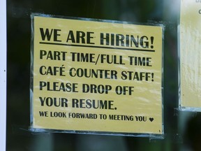 Statistics Canada says the number of job vacancies climbed 3.2 per cent in June to reach a new high as employers were looking to fill more than one million positions for a third consecutive month. A sign for help wanted is pictured in a business window in Ottawa on Tuesday, July 12, 2022.