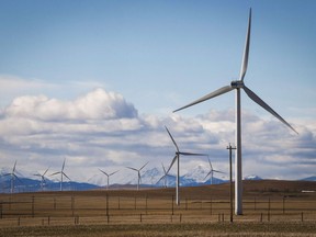 TransAlta Corp. reported a loss of $80 million in its latest quarter compared with a loss of $12 million in the same quarter last year. A TransAlta wind farm is shown near Pincher Creek, Alta., Wednesday, March 9, 2016.