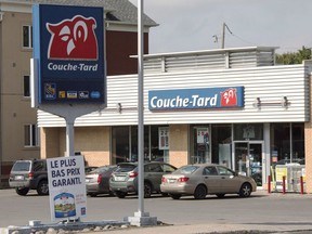 Canadian convenience store giant Alimentation Couche-Tard Inc. says high fuel prices and food inflation are impacting customers and driving sales of its private label brand. A Couche Tard store is seen, Tuesday, September 20, 2016 in Deux-Montagnes, Quebec.