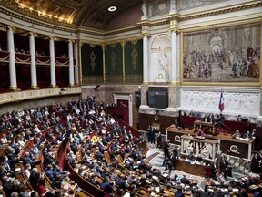 The National Assembly is pictured as French Prime Minister Elisabeth Borne delivers a speech in Paris, France, Wednesday, July 6, 2022. Borne lay out her main priorities at parliament after the government lost its straight majority in the National Assembly in elections last month.