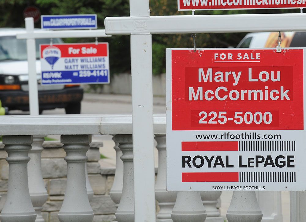 Vancouver home sales tumble, Calgary's slide as rising rates and uncertainty tak..