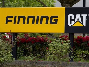 A Finning/Cat sign is shown in Langley, B.C. Tuesday, June 5, 2012.