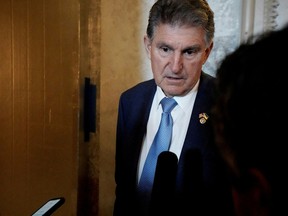 US Senator Joe Manchin (D-WV) speaks with reporters.