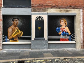 A mural depicting Liz Truss and Rishi Sunak as boxers fighting to be UK prime minister in Belfast, on Aug. 17.