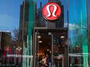 A shopper walks out of the Lululemon Athletica Inc. store in New York.