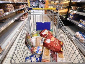 A filled shopping cart at a supermarket in Ahlen, western Germany.