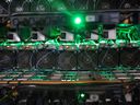Cryptocurrency mining rigs stand on racks at a Bitfarms Ltd facility.  in Saint-Hyacinthe, Que.