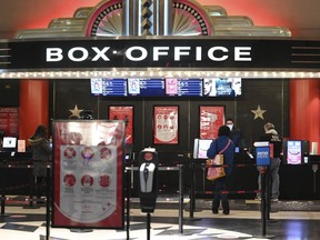 FILE - Movie theaters reopen after COVID-19 closures on March 5, 2021, in New York. For one day, Sept. 3, 2022, movie tickets will be just $3 in the vast majority of American theaters as part of a newly launched 