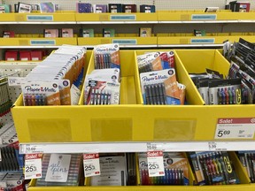 Back to school and office supplies are on sale at a Target store, Wednesday, July 27, 2022, in North Miami, Fla. Back-to-school shopping is extra expensive this year, due to inflation. But coordinating with people in your community can help you save money.