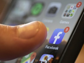 FILE - An iPhone displays the Facebook app in New Orleans, Aug. 11, 2019. Facebook failed to detect election-related misinformation in ads ahead of Brazil's 2022 election, a new report from Global Witness has found, continuing a pattern of not catching material that violates its policies the group says is "alarming."