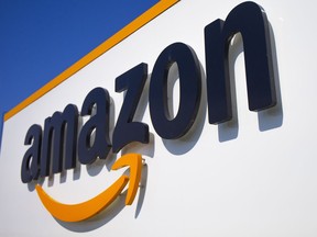 FILE - The Amazon logo is seen in Douai, northern France, April 16, 2020. In August 2022, Amazon has said it will spend billions of dollars in two gigantic acquisitions that, if approved, will broaden its ever growing presence in the lives of consumers. This time, the company is targeting two areas: health care and the 