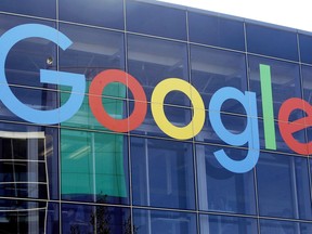 FILE - A sign is shown on a Google building at their campus in Mountain View, Calif., on Sept. 24, 2019. Hundreds of Google employees are petitioning the company to extend its abortion healthcare benefits to contract workers and to strengthen privacy protections for Google users searching for abortion information online.