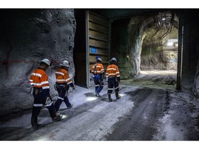 Workers walk through a tunnel in the underground mining project at the Oyu Tolgoi copper-gold mine, jointly owned by Rio Tinto Group's Turquoise Hill Resources Ltd. unit and state-owned Erdenes Oyu Tolgoi LLC, in Khanbogd, the South Gobi desert, Mongolia, on Saturday, Sept. 22, 2018. Mongolia plans to supply the copper-gold mine with energy by the start of 2019, Mongolian Energy Minister Davaasuren Tserenpil said in interview with newspaper Zasgiin Gazariin Medee. The massive copper-and-gold mine was discovered in 2001 and Rio, the world's second-biggest miner, gained control in 2012.