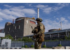 A Russian serviceman patrols the territory of the Zaporizhzhia Nuclear Power Station in Energodar. Photographer: Andrey Borodulin/AFP/Getty Images