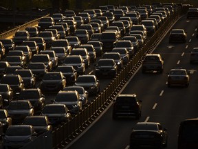 Rush hour traffic backs up along a highway in Beijing, China, on April 23, 2020. Hainan island in the South China Sea said Monday, Aug. 22, 2022 that it will become China's first region to ban sales of gasoline- and diesel-powered cars to curb climate-changing carbon emissions.