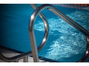Hand rails by the side of a swimming pool. Photographer: Bloomberg Creative Photos/Bloomberg Creative Collection