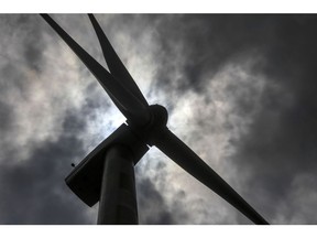 A wind turbine manufactured by Suzlon Energy Ltd. operates at the Ostro Energy Pvt. Dewas Wind Project in Dewas, Madhya Pradesh, India, on Monday, Aug. 14, 2017. As of June, India had 32 gigawatts of wind capacity. The nation is aiming to raise that to 60 gigawatts by 2022 as part of the country's climate pledge. Photographer: Dhiraj Singh/Bloomberg