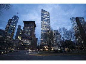The Taunusturm building complex, center, stands illuminated at dusk in Frankfurt, Germany, on Thursday, March 8, 2018. Goldman Sachs Group Inc., JPMorgan Chase & Co. and Morgan Stanley are on a hiring drive in Frankfurt as global investment banks race to establish new headquarters inside the European Union in time for Brexit.