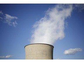A plume of steam rises from a cooling tower at the American Electric Power Co. Inc. coal-fired John E. Amos Power Plant in Winfield, West Virginia, U.S., on Wednesday, July 18, 2018. Photographer: Luke Sharrett/Bloomberg