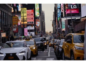 Vehicles sit in traffic during rush hour in the Times Square area of New York, U.S., on Tuesday, April 2, 2019. The Metropolitan Transportation Authority faces near-rebellion from riders and a $40 billion estimate to repair or improve its trains, subways, buses, bridges and tunnels. To raise the cash, New York Governor Andrew Cuomo won passage of a congestion-pricing plan that will tax access to Manhattan's priciest parts to encourage people to get around underground.