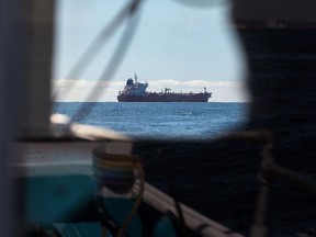 An oil tanker sits at anchor in this view from a fishing boat off the coast of Southwold, U.K., on Friday, May 15, 2020. Nine tankers carrying about 5.58 million barrels of North Sea crude that loaded in April are floating off U.K. ports, according to ship-tracking data compiled by Bloomberg. Photographer: Chris Ratcliffe/Bloomberg