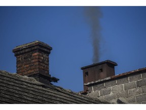 RYBNIK, POLAND – FEBRUARY 22: Black smoke comes out of a chimney on February 22, 2021 in Rybnik, Poland. Europe's most coal-dependent country, which relies on it to produce 70% of its power has recently adopted an energy strategy to 2040 which has been facing criticism by Miners Trade Unions and environmental activists. The "PEP 2040" pledges to obtain 23 per cent of its energy from renewable sources by 2030 and to have its first nuclear power plant in 2033.