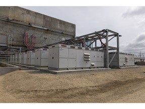 Power inverters outside the battery building at the Vistra Corp. Moss Landing Energy Storage Facility in Moss Landing, California, U.S., on Tuesday, April 20, 2021. The facility is the world's largest battery energy storage system.