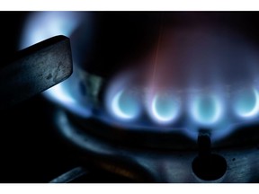 Natural gas burns on a domestic kitchen stove in Rome, Italy, on Friday, Dec. 24, 2021. European gas prices declined to near the lowest level in three weeks, with increased inflows at terminals in the region bringing relief to the tight market. Photographer: Alessia Pierdomenico/Bloomberg