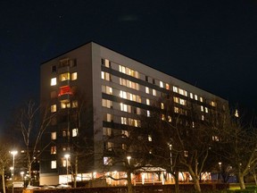 Electric lights on a block of residential flats in the Hisingen district, in Gothenburg, Sweden, on Monday, Jan. 17, 2022. The Swedish government set aside 6 billion kronor ($664 million) to lessen the impact of soaring power bills on households, saying Russia's approach to supplying gas to Europe this winter was a major factor in stoking costs last month.