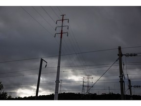 Electricity transmission towers in Vila Franca de Xira, Portugal, on Wednesday, April 6, 2022. Portugal said it's discussing an electricity price cap with neighboring Spain to help protect households and businesses from soaring energy costs.