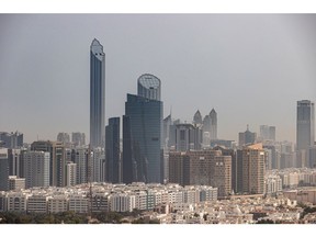 Residential and commercial skyscrapers in Abu Dhabi, United Arab Emirates, on Sunday, April 10, 2022. Abu Dhabi regulators approved a framework for special purpose acquisition companies, looking to capture some of the blank-check boom that has gripped global markets for the past two years. Photographer: Christopher Pike/Bloomberg