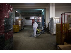 A worker moves crates of bread in a warehouse at the Dobrogea Group flour mill and bread factory in Constanta, Romania, on Wednesday, May 18, 2022. Wheat supplies remain under pressure globally, with unfavorable weather and protectionist measures adding to Ukraine's stymied exports as the country's Black Sea Ports remain blocked..