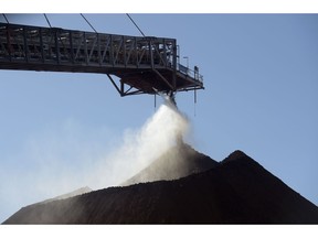 A conveyor belt transports iron ore to a stockpile at the Gudai-Darri mine operated by the Rio Tinto Group in the Pilbara region of Western Australia, Australia, on Tuesday, June 21, 2022. Gudai-Darri, with an annual capacity of 43 million tons, is expected to increase iron ore production volumes and improve product mix from the Pilbara from the second half of this year, according to a company statement. Photographer: Carla Gottgens/Bloomberg