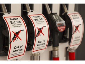 Out of service tags cover empty unleaded and diesel petrol pumps at a gas station in Erlensee, Germany. Photographer: Alex Kraus/Bloomberg